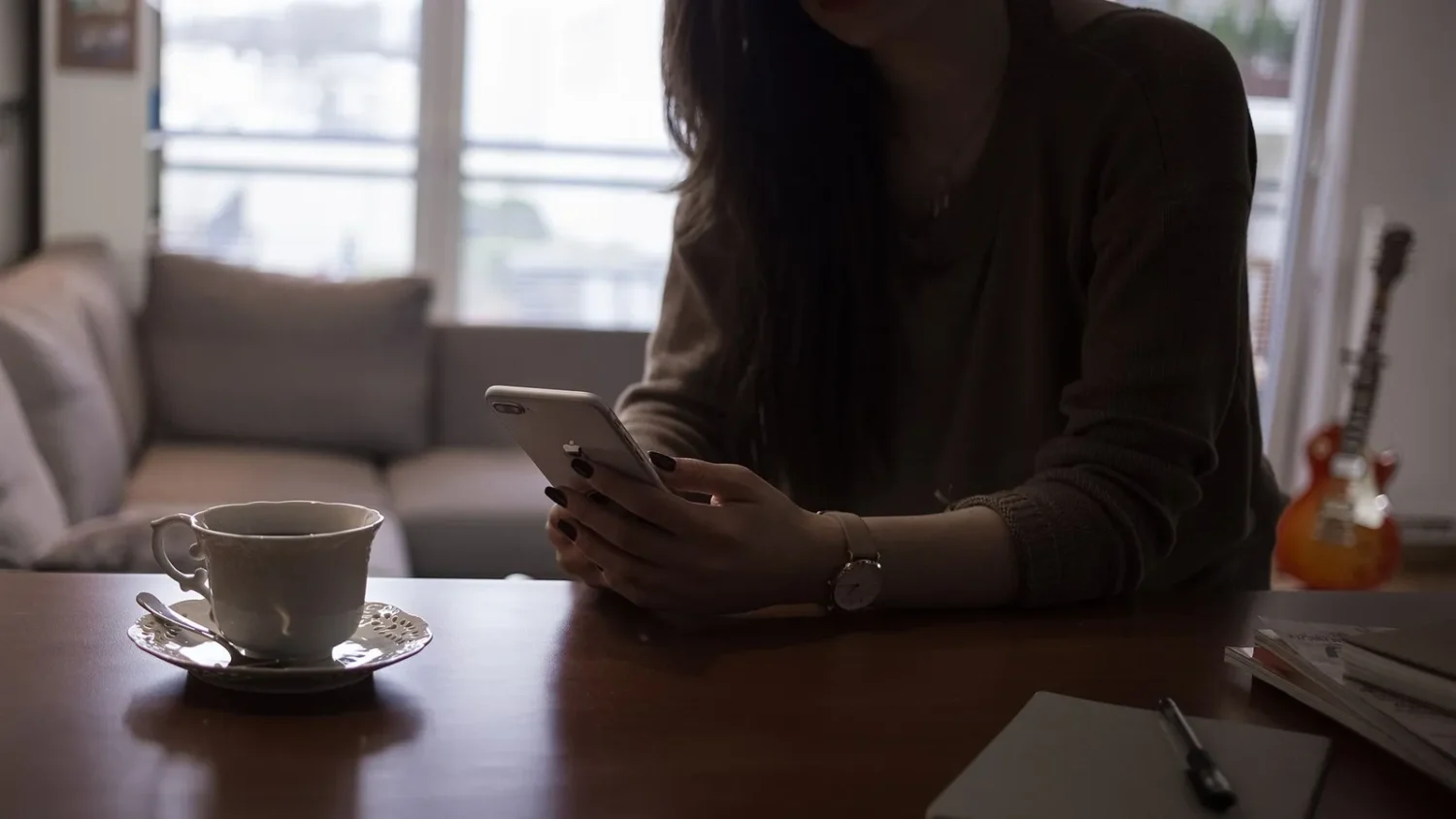 Female holding iPhone 8 Plus