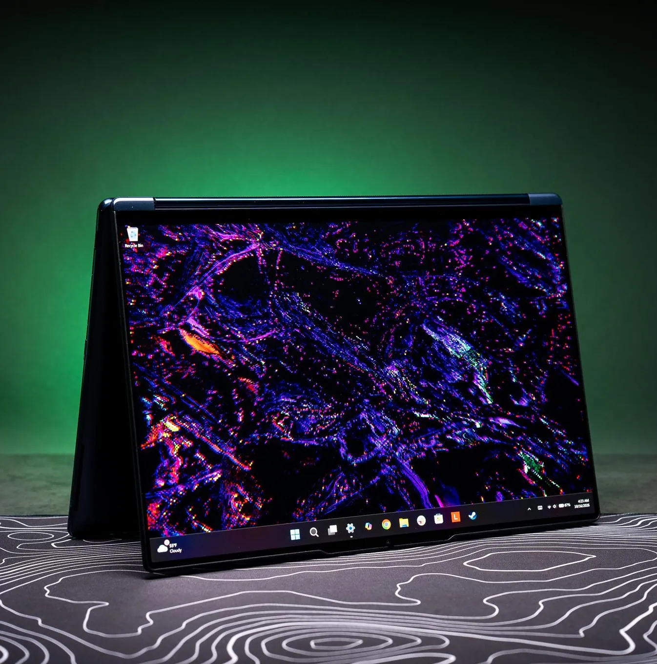Иллюстрация к материалу «Новый ноутбук Lenovo Yoga на базе RTX Spark натолкнул на мысли о сенсорном MacBook». Фото: The Verge.